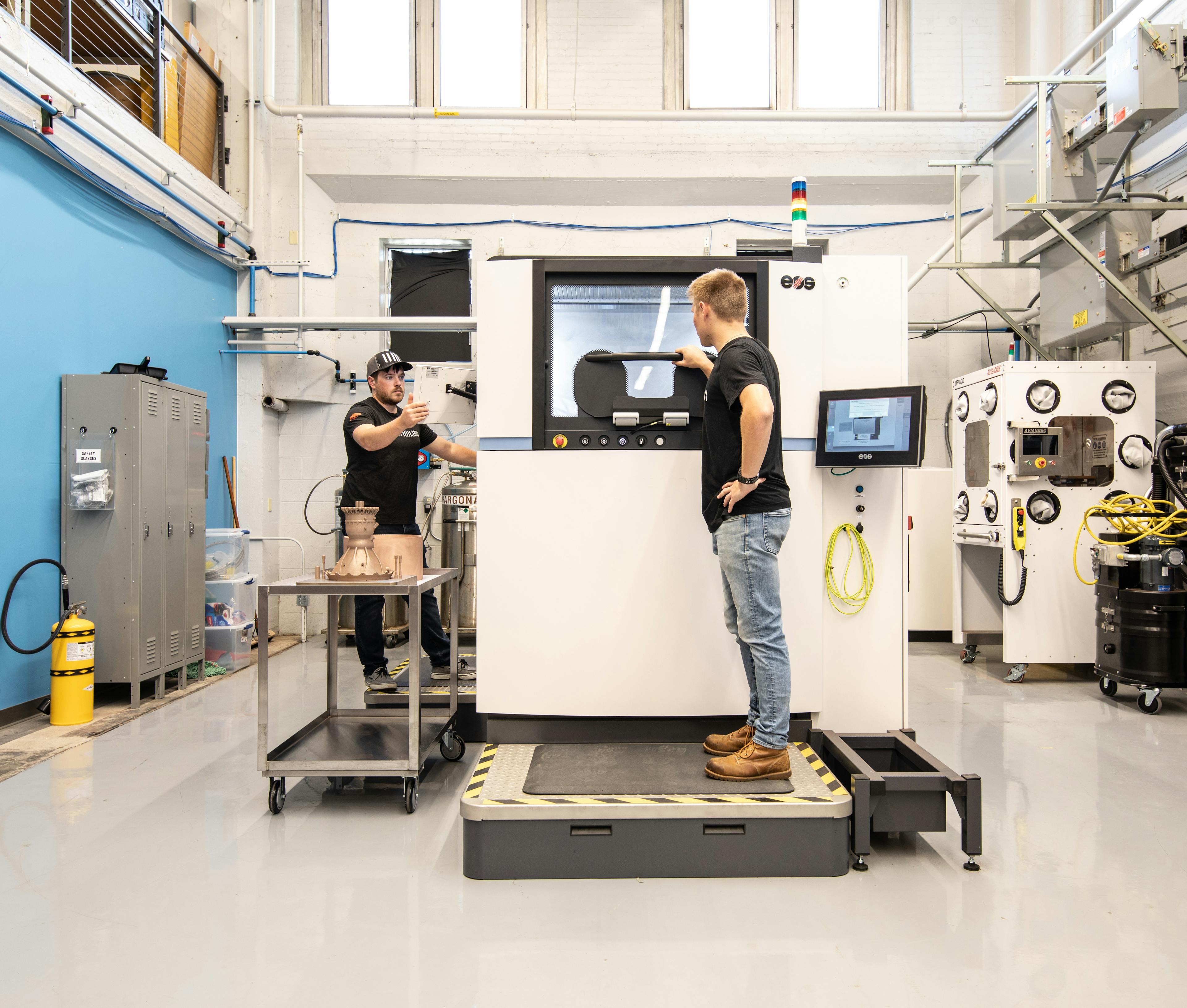 Additive manufacturing engineers Thomas Pomorski and Ty Barzak at Ursa Major's Advanced Manufacturing Lab in Youngstown, Ohio.